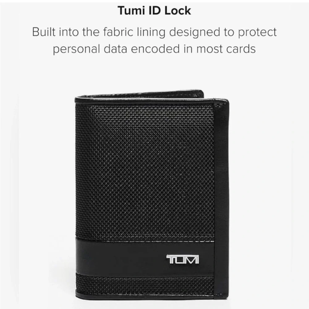 Tumi Black Textured Wallet new without tags in excellent condition